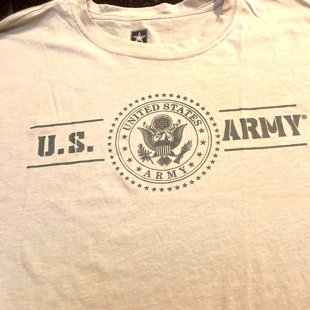 New United States Army t-shirt. Tan in color with black letters. US Army /sleeve